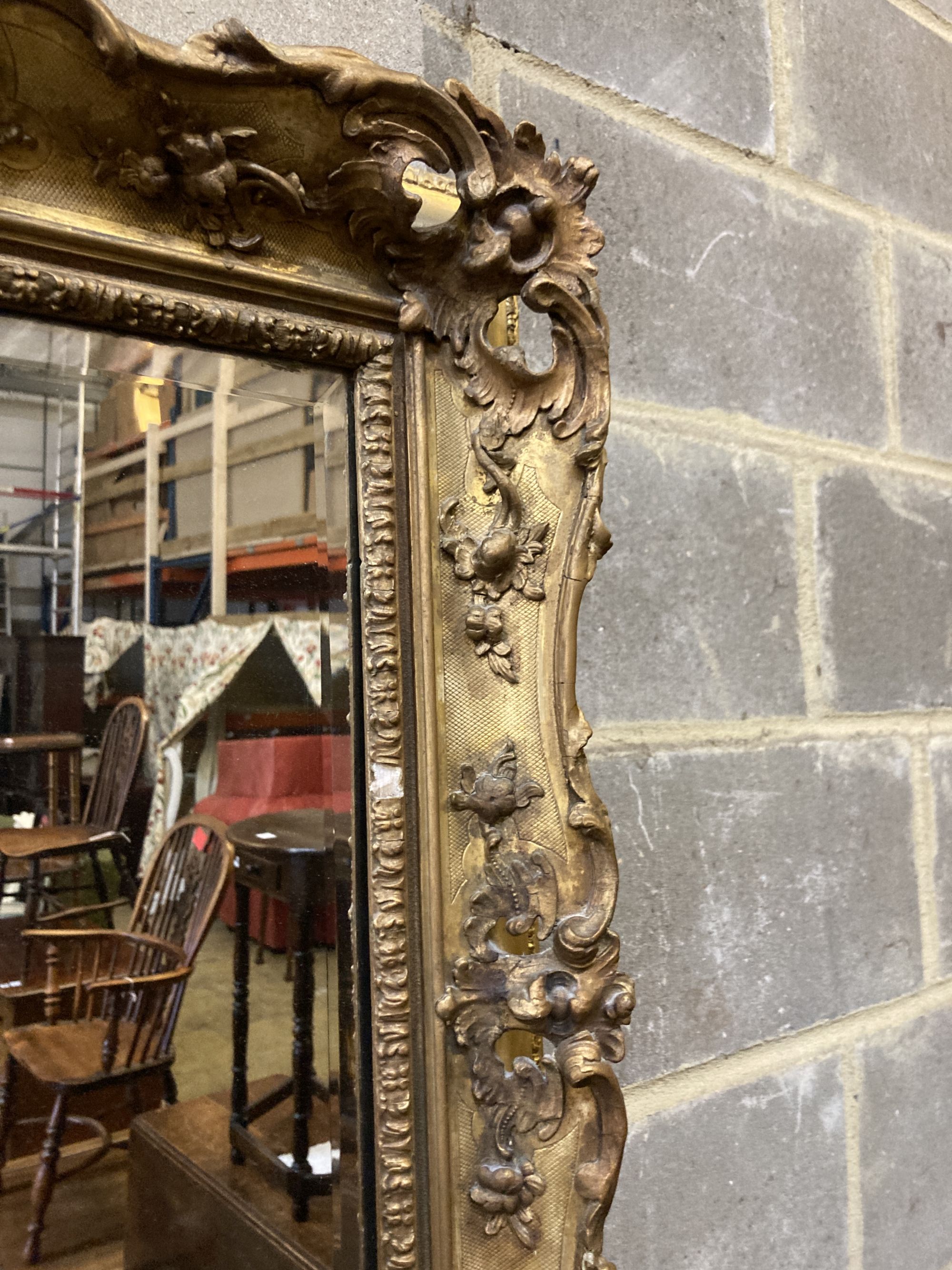 A Victorian rectangular giltwood and gesso frame (now as a wall mirror) width 53cm, height 69cm